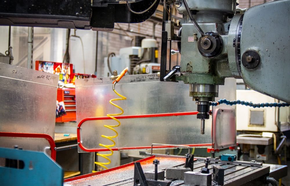 Operator working on factory machinery